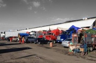 Comerciantes de la Central de Abastos interponen amparo contra barda perimetral; Ayuntamiento busca diálogo