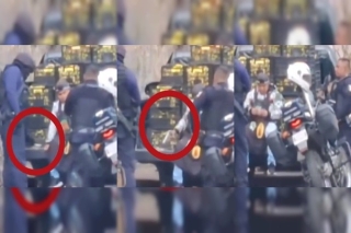 Sorprenden a policias vendiendo arma a comerciante en Cuernavaca