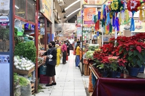 A comprar en mercados locales para afrontar la cuesta de enero